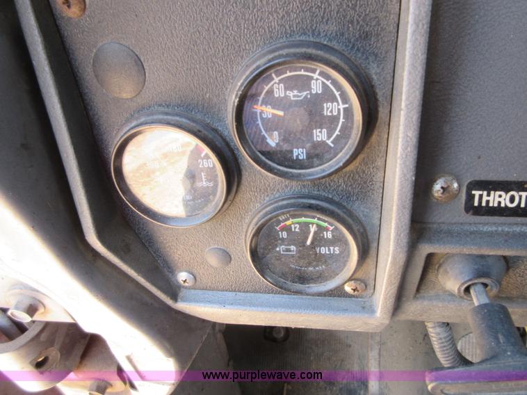 image for item D2435 1981 Mack DM6855 roll off truck