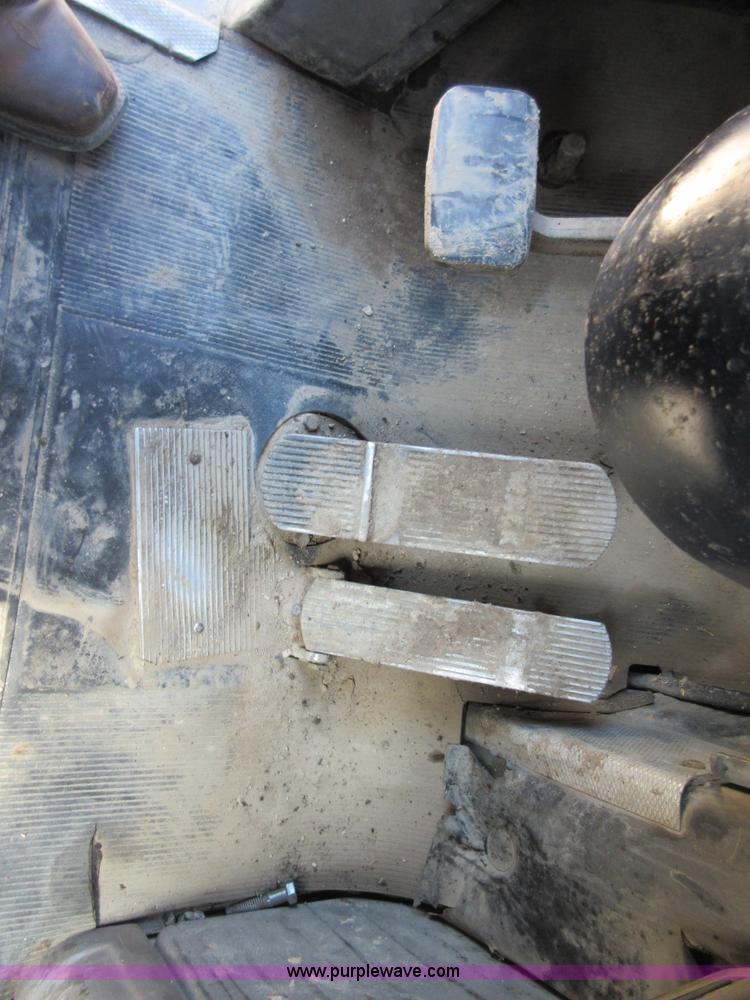 image for item D2435 1981 Mack DM6855 roll off truck