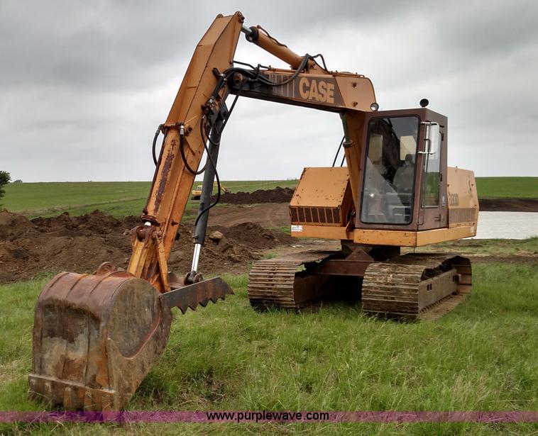 image for item F7794 1984 Case 880D excavator