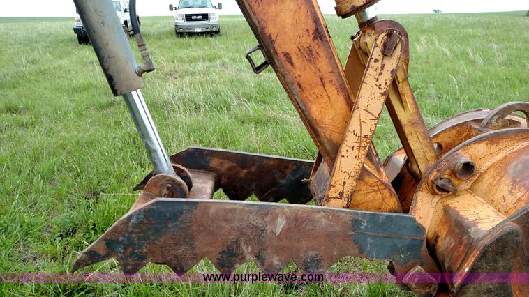 image for item F7794 1984 Case 880D excavator