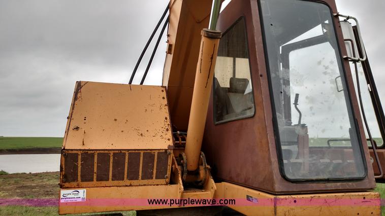 image for item F7794 1984 Case 880D excavator