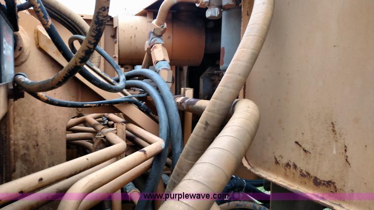 image for item F7794 1984 Case 880D excavator