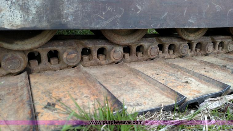 image for item F7794 1984 Case 880D excavator