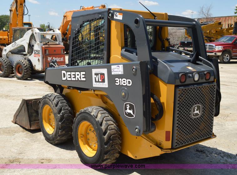 image for item G3566 2012 John Deere 318D skid steer