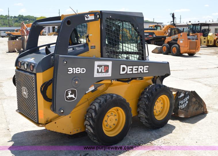 image for item G3566 2012 John Deere 318D skid steer