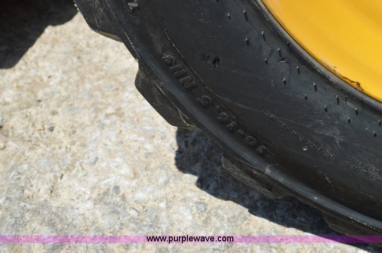 image for item G3566 2012 John Deere 318D skid steer