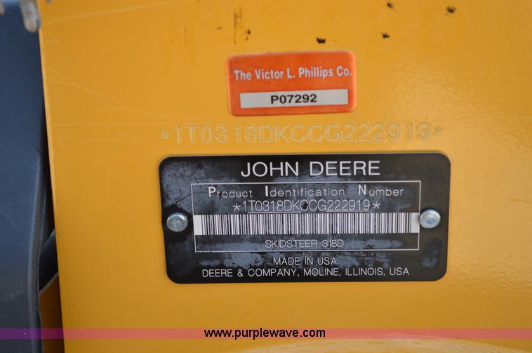image for item G3566 2012 John Deere 318D skid steer