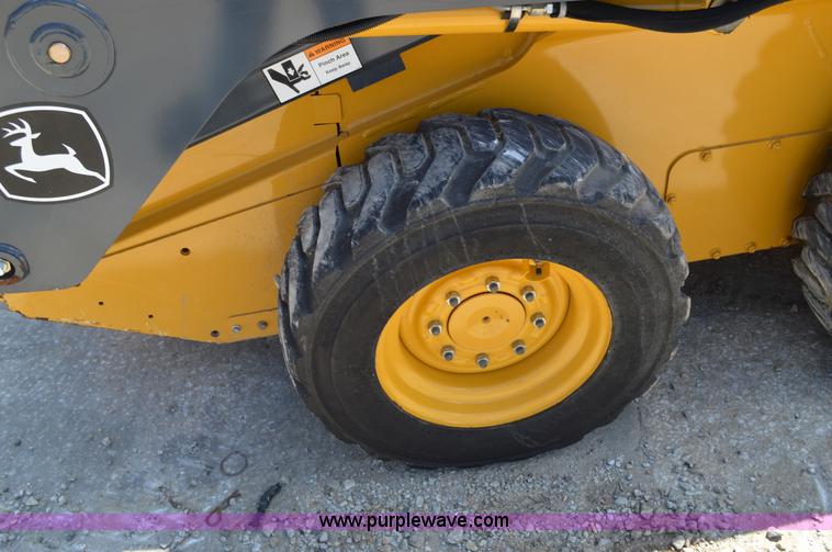 image for item G3566 2012 John Deere 318D skid steer