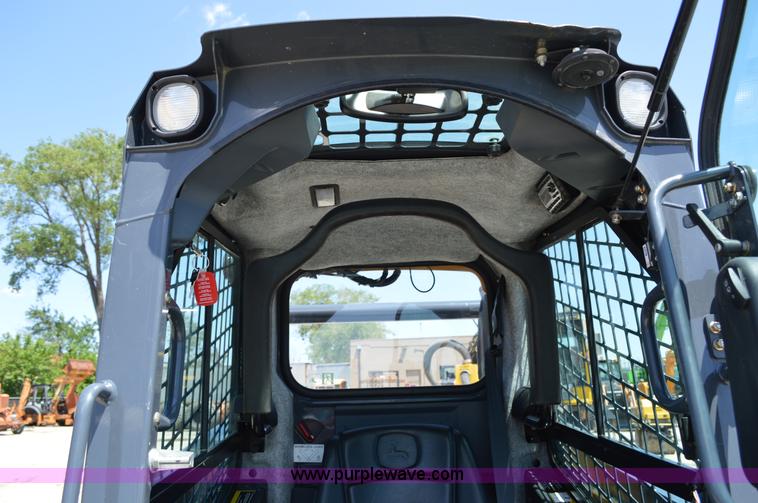 image for item G3566 2012 John Deere 318D skid steer