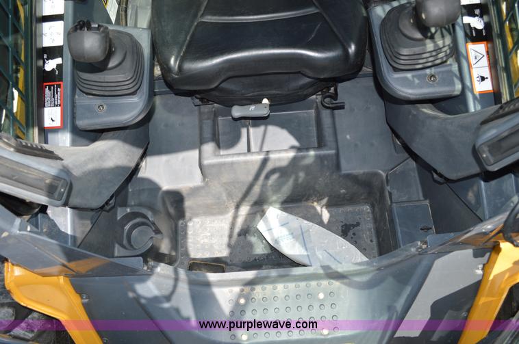 image for item G3566 2012 John Deere 318D skid steer