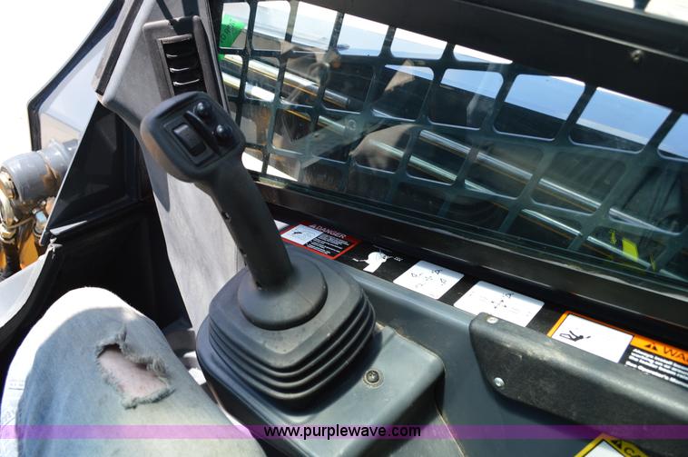 image for item G3566 2012 John Deere 318D skid steer