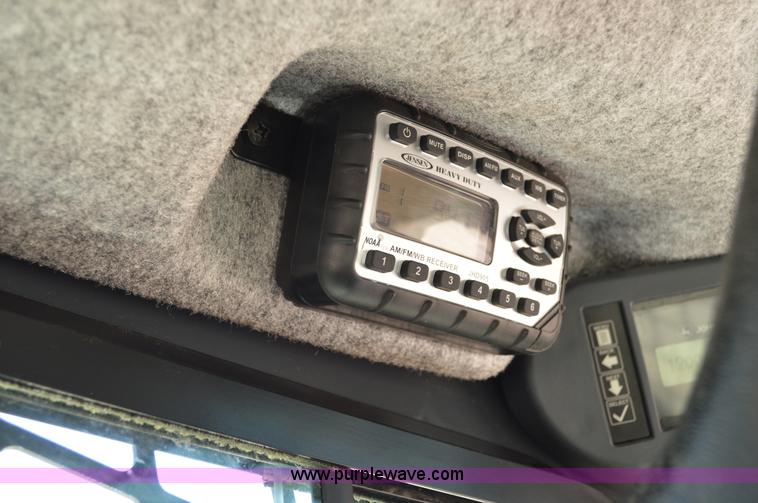 image for item G3566 2012 John Deere 318D skid steer