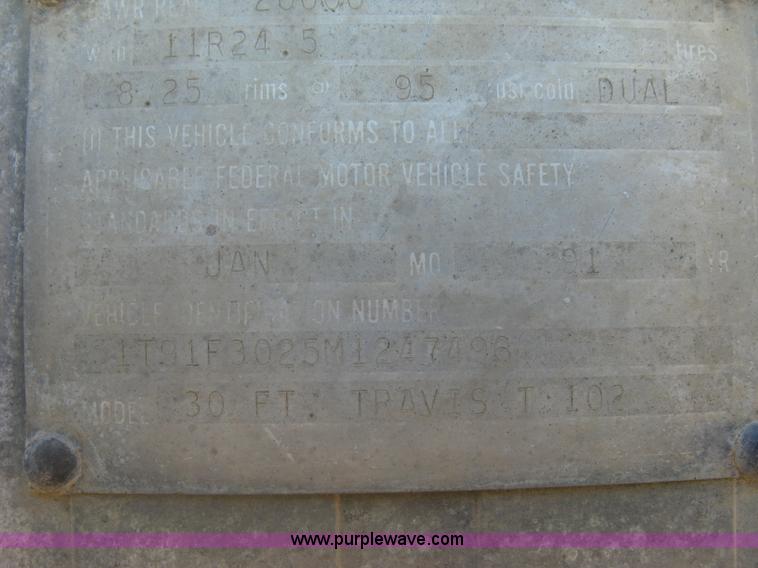 image for item H8556 1991 Travis T102 end dump trailer