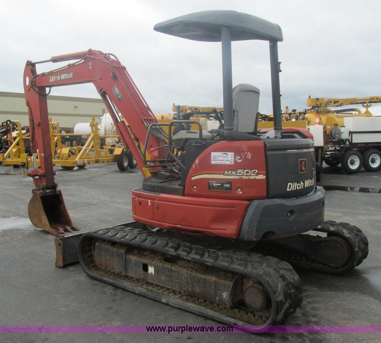 image for item K5066 2005 Ditch Witch MX502 compact excavator