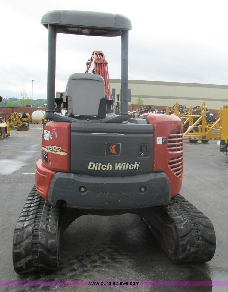 image for item K5066 2005 Ditch Witch MX502 compact excavator