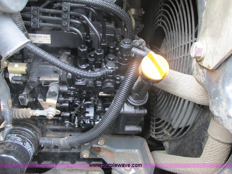 image for item K5066 2005 Ditch Witch MX502 compact excavator