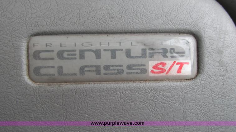 image for item J8528 2002 Freightliner Century Class ST120 semi truck