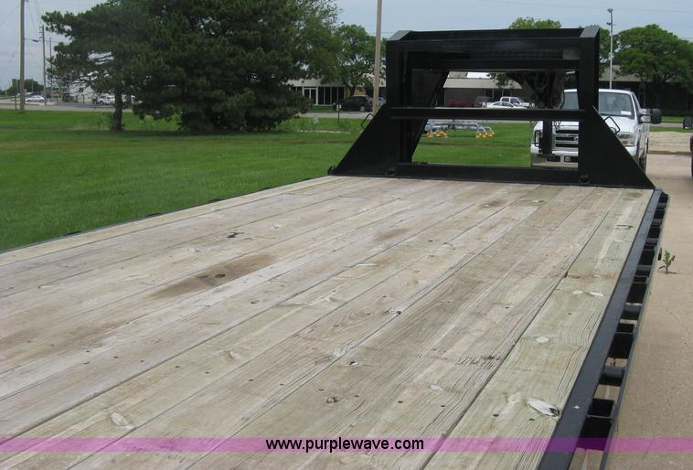 image for item H8549 2012 PJ gooseneck flatbed trailer