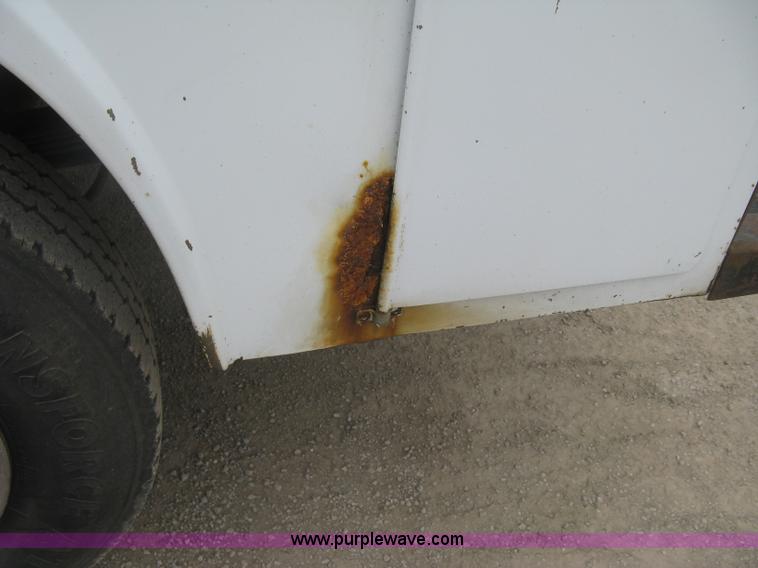 image for item H8561 2003 Ford F250 Super Duty XL Ext. Cab utility truck