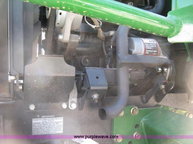 image for item H8570 2010 John Deere 2305HST MFWD utility tractor