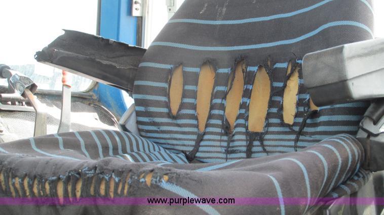 image for item I3004 Ford TW25 MFWD tractor