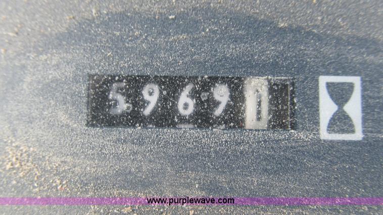 image for item I3004 Ford TW25 MFWD tractor