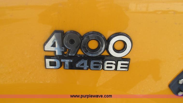 image for item J8516 2002 International 4900 Crew Cab dump truck