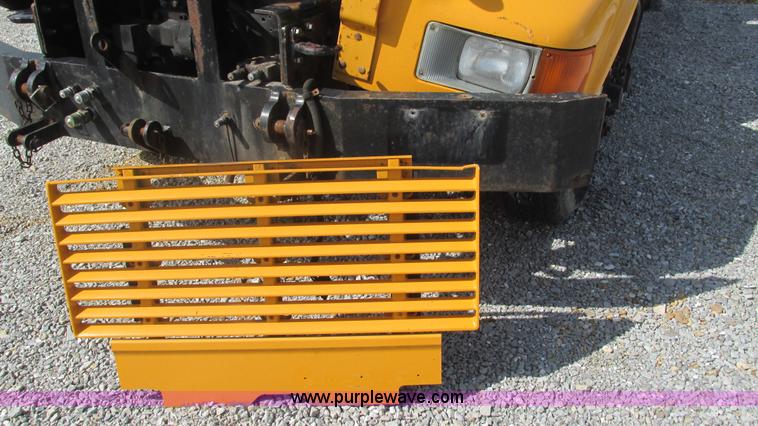 image for item J8516 2002 International 4900 Crew Cab dump truck