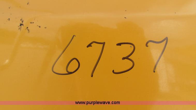 image for item J8516 2002 International 4900 Crew Cab dump truck