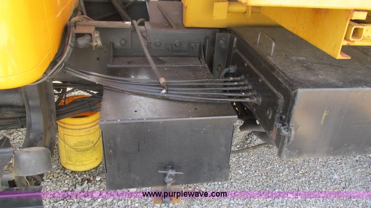 image for item J8516 2002 International 4900 Crew Cab dump truck