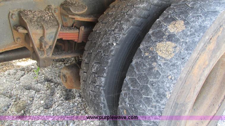 image for item J8516 2002 International 4900 Crew Cab dump truck