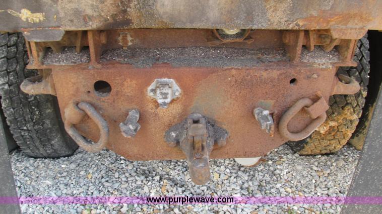 image for item J8516 2002 International 4900 Crew Cab dump truck