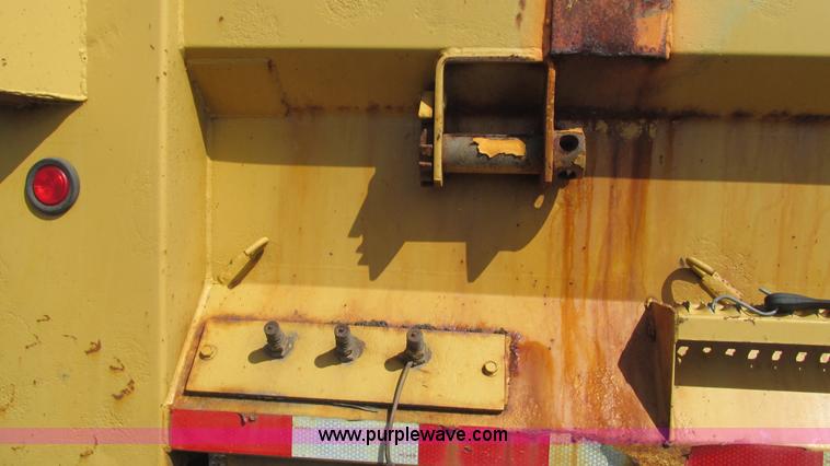 image for item J8516 2002 International 4900 Crew Cab dump truck