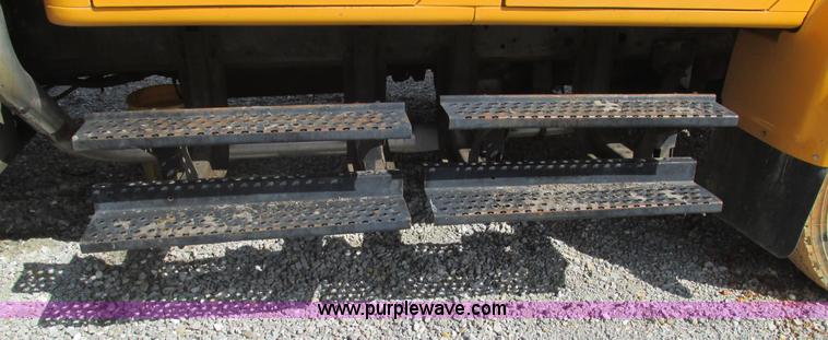 image for item J8516 2002 International 4900 Crew Cab dump truck