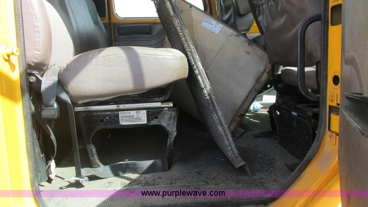 image for item J8516 2002 International 4900 Crew Cab dump truck