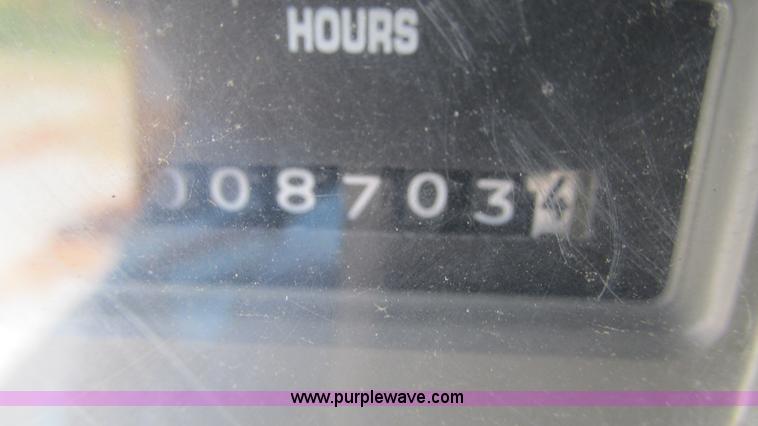 image for item J8516 2002 International 4900 Crew Cab dump truck