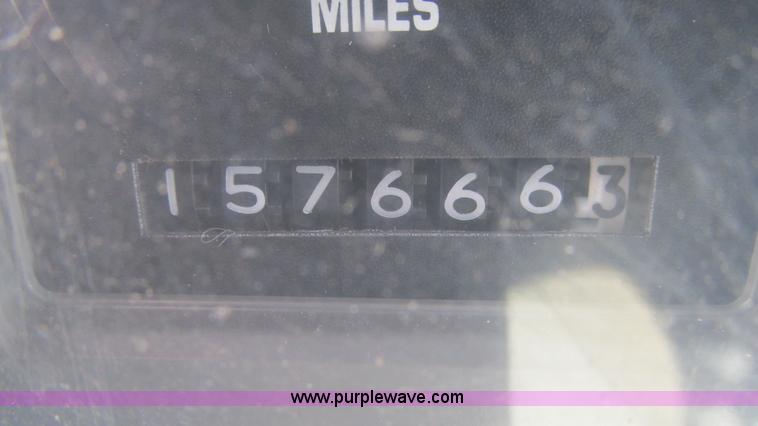 image for item J8516 2002 International 4900 Crew Cab dump truck