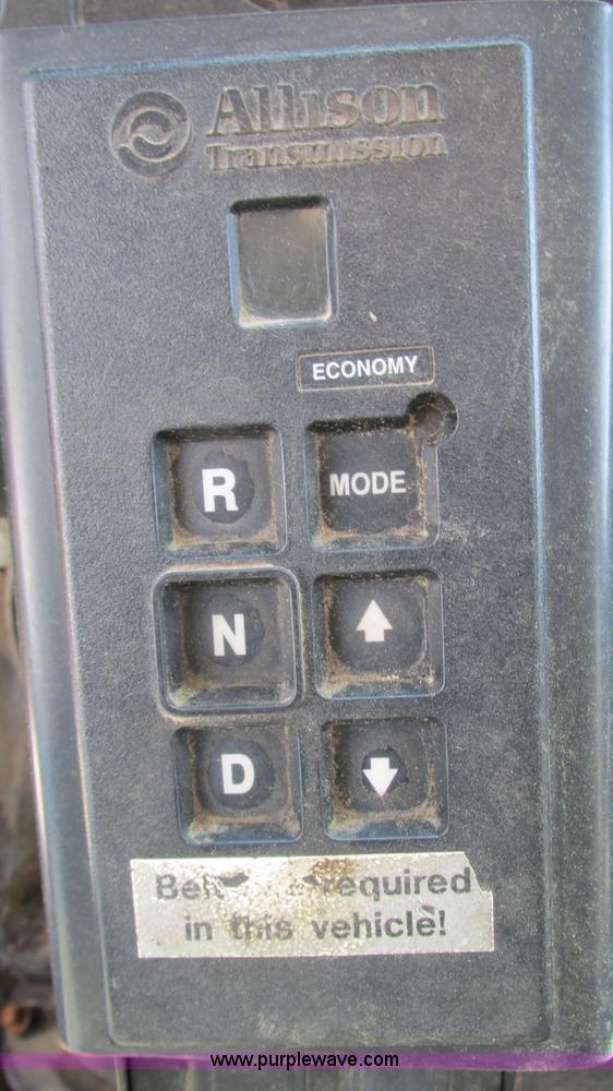 image for item J8516 2002 International 4900 Crew Cab dump truck