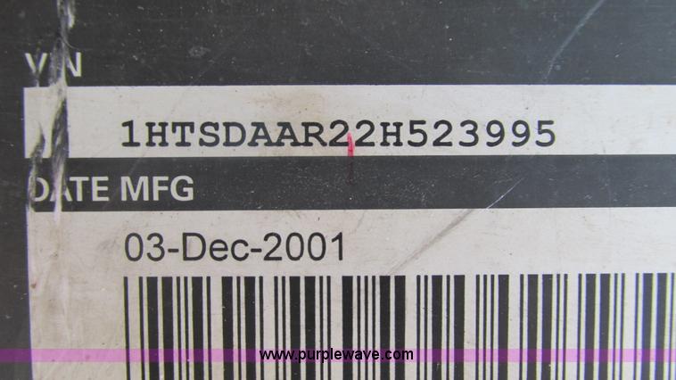 image for item J8516 2002 International 4900 Crew Cab dump truck