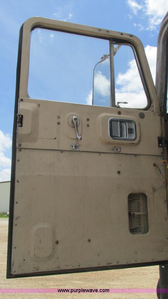 image for item J8520 1978 White Freightliner semi truck