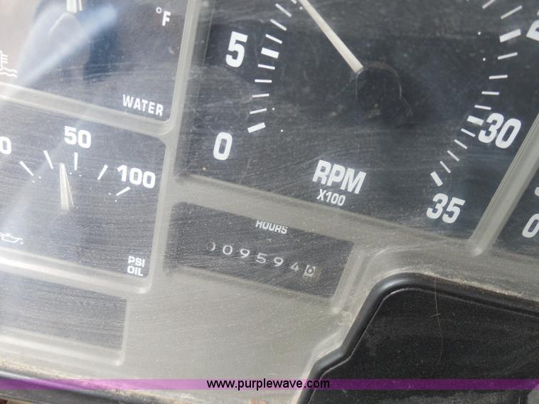 image for item K7507 2002 International 4900 Crew Cab dump truck