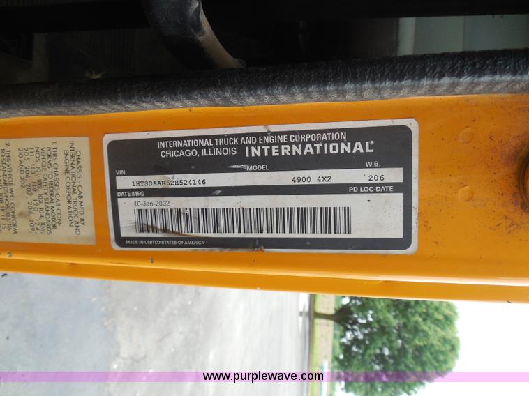 image for item K7507 2002 International 4900 Crew Cab dump truck