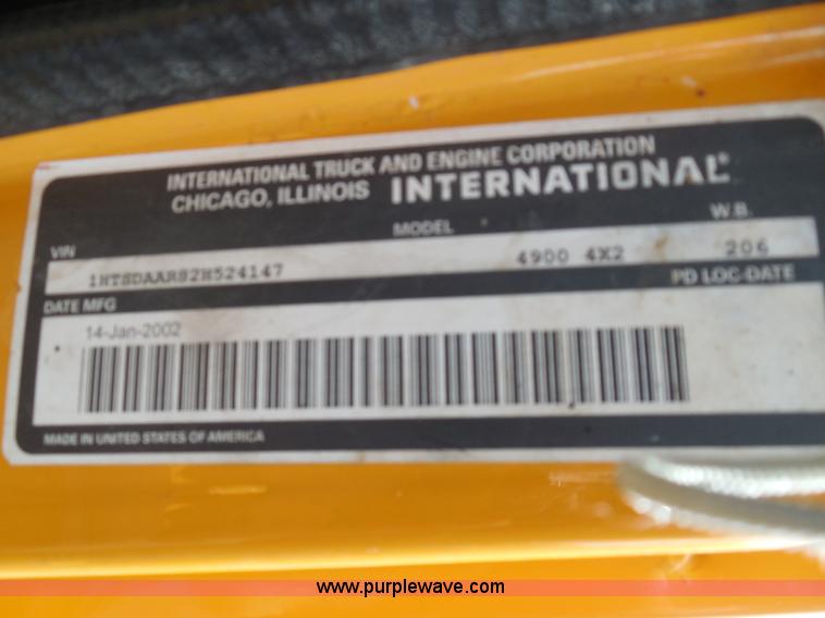 image for item K7509 2002 International 4900 Crew Cab dump truck