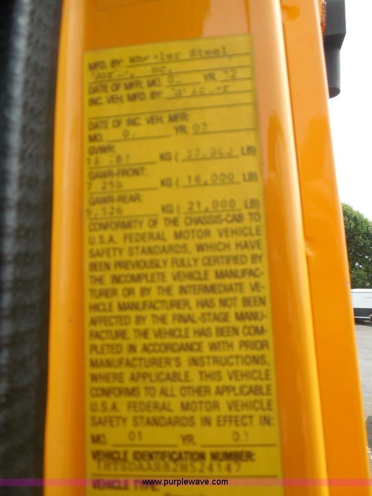 image for item K7509 2002 International 4900 Crew Cab dump truck