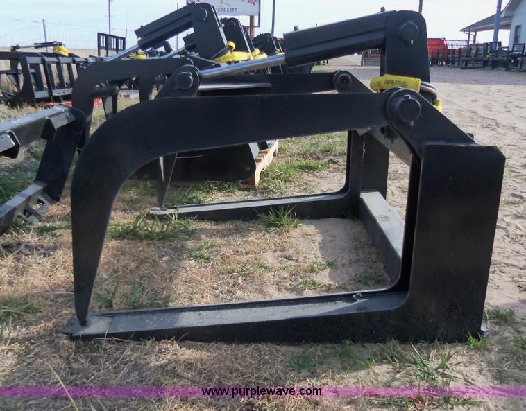 Wildkat heavy duty skid steer fork/hay grapple in Newton, KS Item