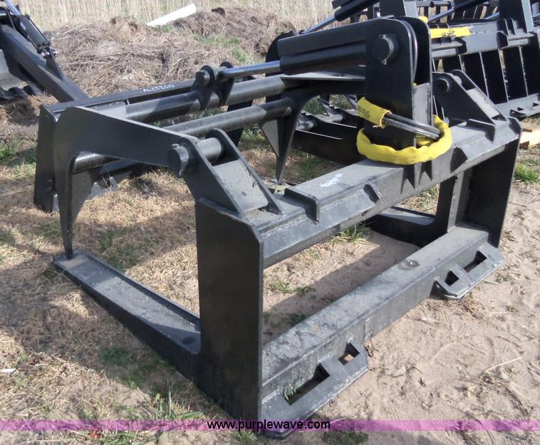 Wildkat heavy duty skid steer fork/hay grapple in Newton, KS Item