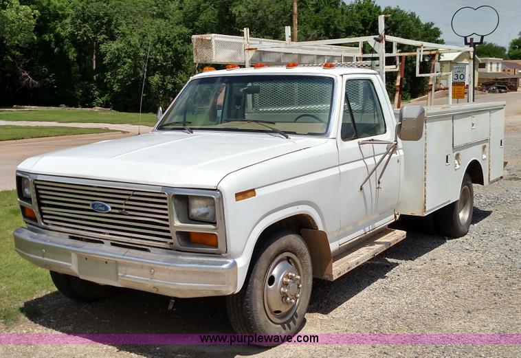 image for item F7825 1984 Ford F350 utility truck