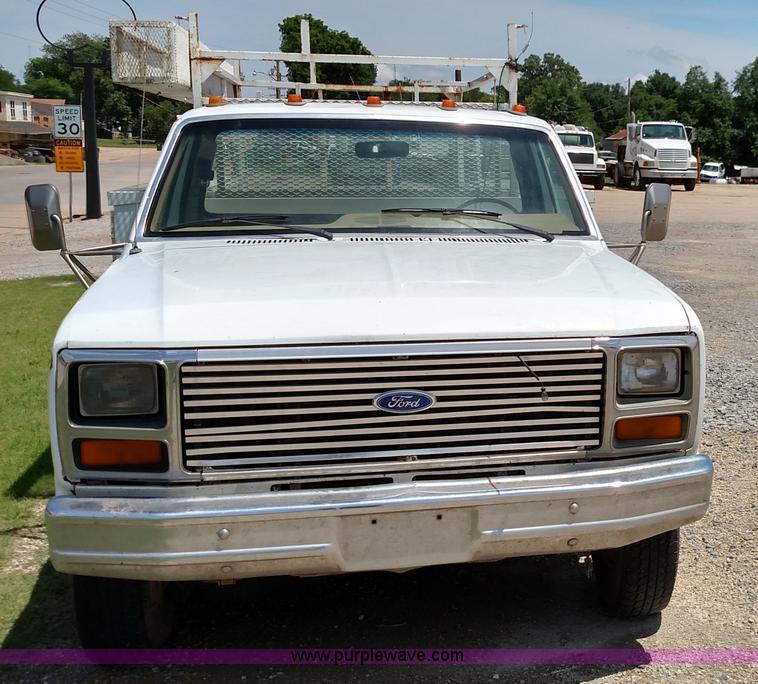 image for item F7825 1984 Ford F350 utility truck