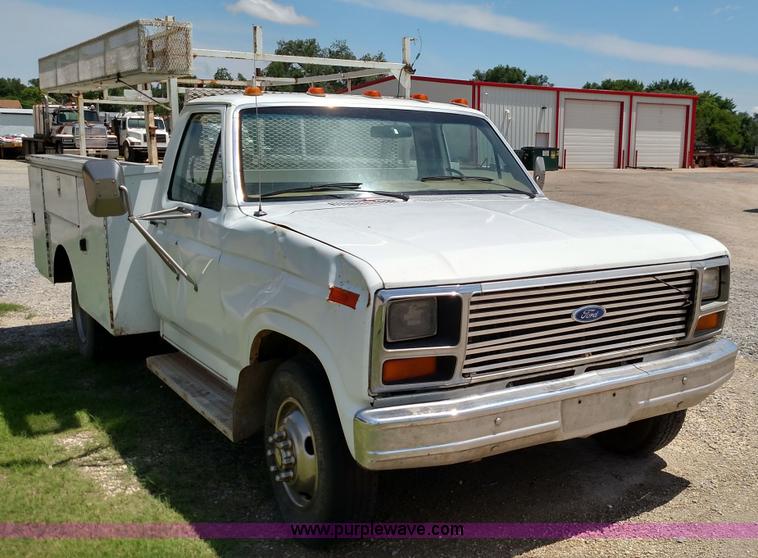 image for item F7825 1984 Ford F350 utility truck