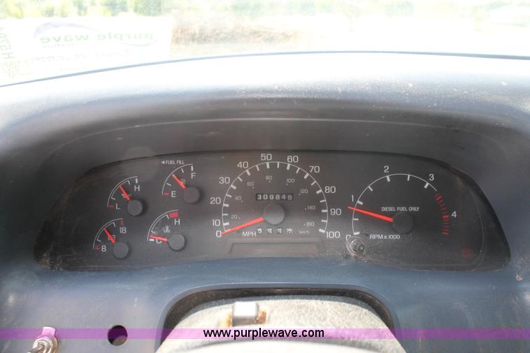 image for item H5794 1999 Ford F350 Super Duty XL Crew Cab flatbed pickup truck